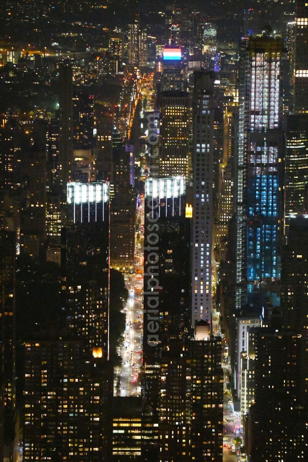 New York at night from the bird perspective: Night lighting High-rise ensemble of Time Warner Center on Columbus Circle in the district Manhattan in New York in United States of America