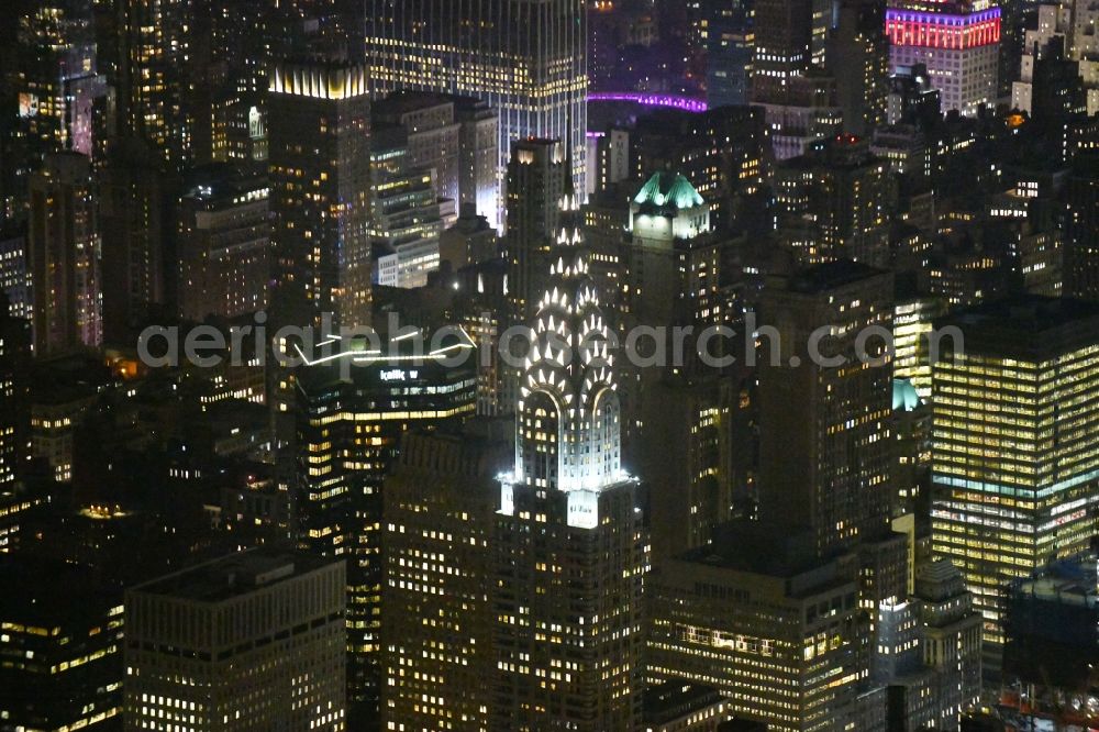 Aerial image at night New York - Night lighting High-rise buildings Chrysler Building on Lexington Avenue in New York in United States of America
