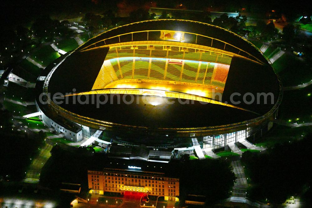 Aerial photograph at night Leipzig - Night lighting on the sports ground of the stadium Red Bull Arena Am Sportforum in Leipzig in the state Saxony, Germany