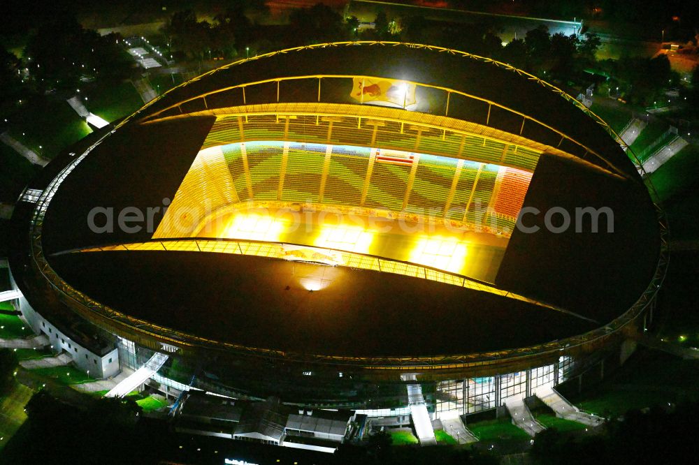 Aerial image at night Leipzig - Night lighting on the sports ground of the stadium Red Bull Arena Am Sportforum in Leipzig in the state Saxony, Germany