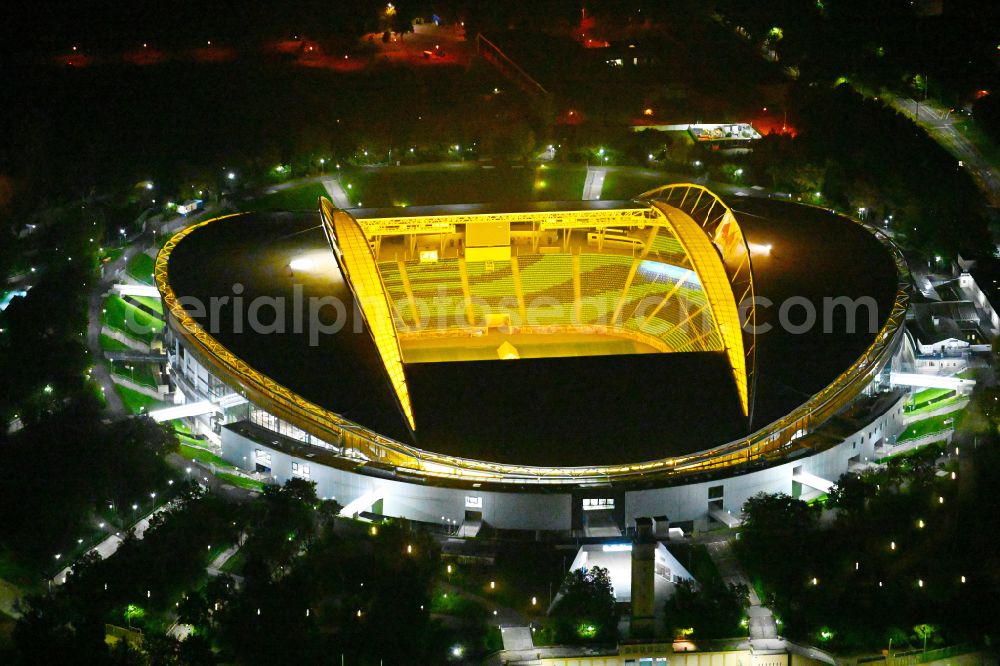 Leipzig at night from above - Night lighting on the sports ground of the stadium Red Bull Arena Am Sportforum in Leipzig in the state Saxony, Germany