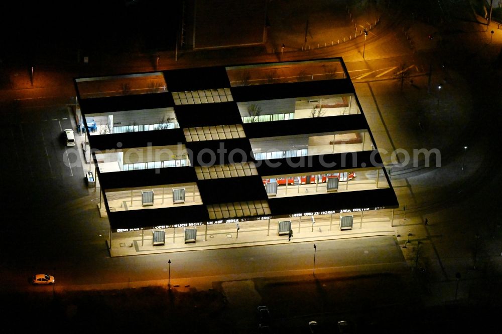 Gotha at night from the bird perspective: Night aerial view of the ZOB omnibus station and the tram stop of the public transport company in Gotha in the state of Thuringia, Germany