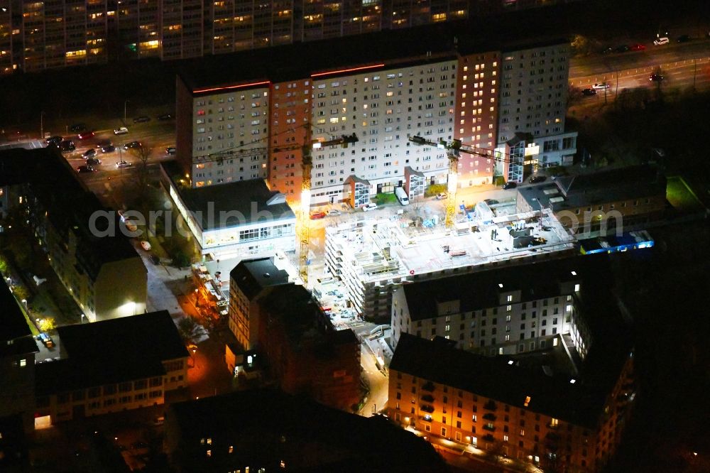 Berlin at night from above - Night lighting construction site for the new residential and commercial Corner house - building on Rathausstrasse in the district Lichtenberg in Berlin, Germany