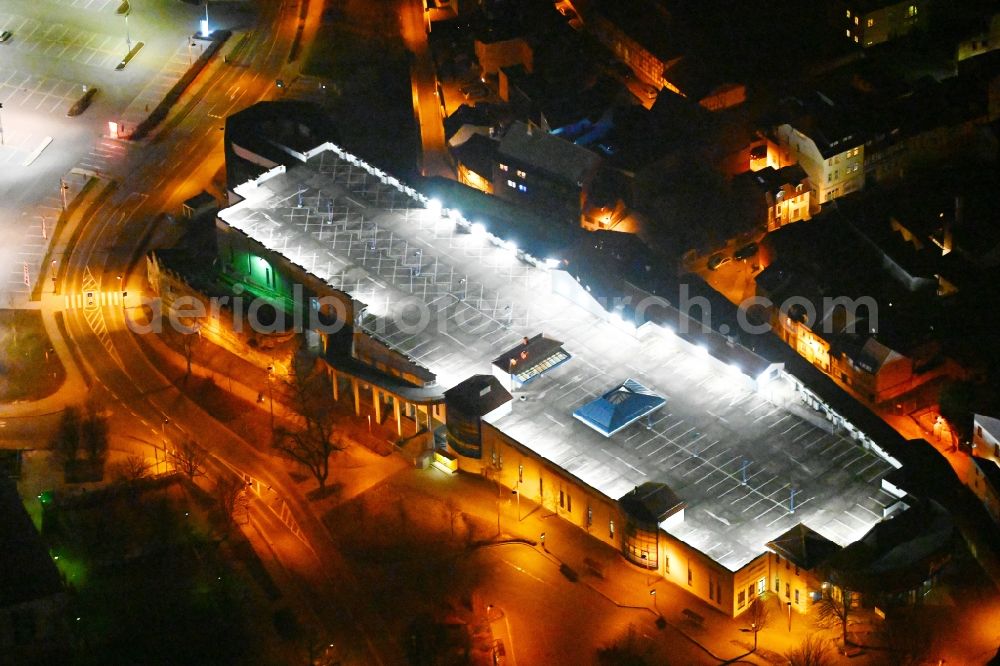 Mühlhausen at night from above - Night lighting building of the shopping center Burggalerie Muehlhausen in Muehlhausen in the state Thuringia, Germany