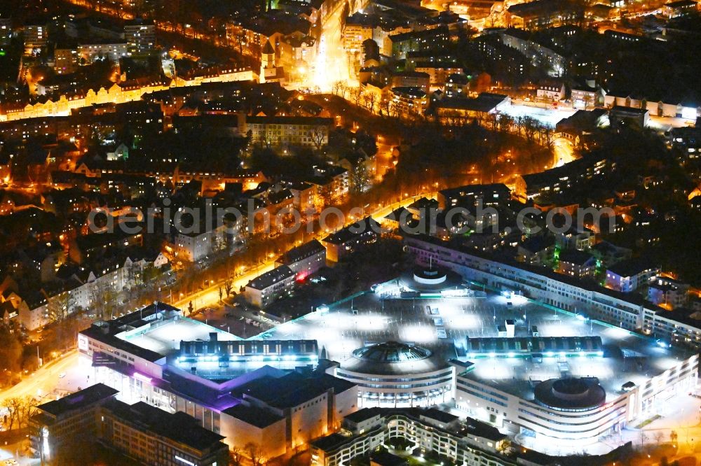 Augsburg at night from above - Night lighting building of the shopping center City-Galerie Augsburg on Willy-Brandt-Platz in Augsburg in the state Bavaria, Germany