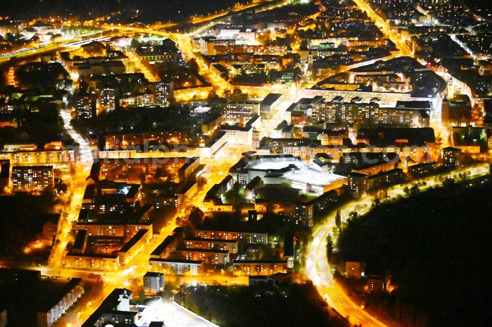 Dessau at night from the bird perspective: Night lighting building of the shopping center Dessau-Center on Franzstrasse in Dessau in the state Saxony-Anhalt, Germany