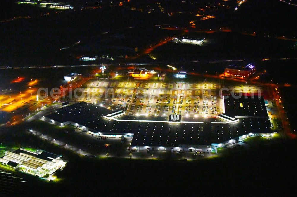 Landsberg at night from above - Night lighting Building of the shopping center Halle Center Peissen on Saarbruecker Strasse in the district Peissen in Landsberg in the state Saxony-Anhalt, Germany