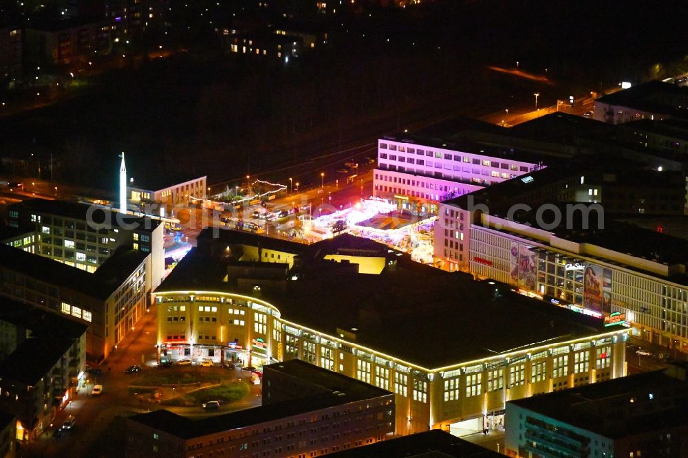 Aerial photograph at night Berlin - Night lighting building of the shopping center Marktplatz Center - Berlin-Hellersdorf on Stendaler Strasse in the district Hellersdorf in Berlin, Germany