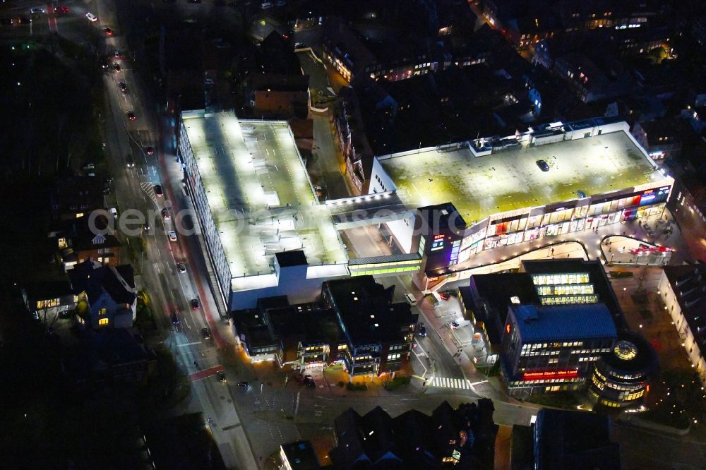 Stade at night from above - Night lighting building of the shopping center Neuer Pferdemarkt in Stade in the state Lower Saxony, Germany