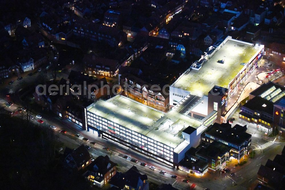 Stade at night from above - Night lighting building of the shopping center Neuer Pferdemarkt in Stade in the state Lower Saxony, Germany