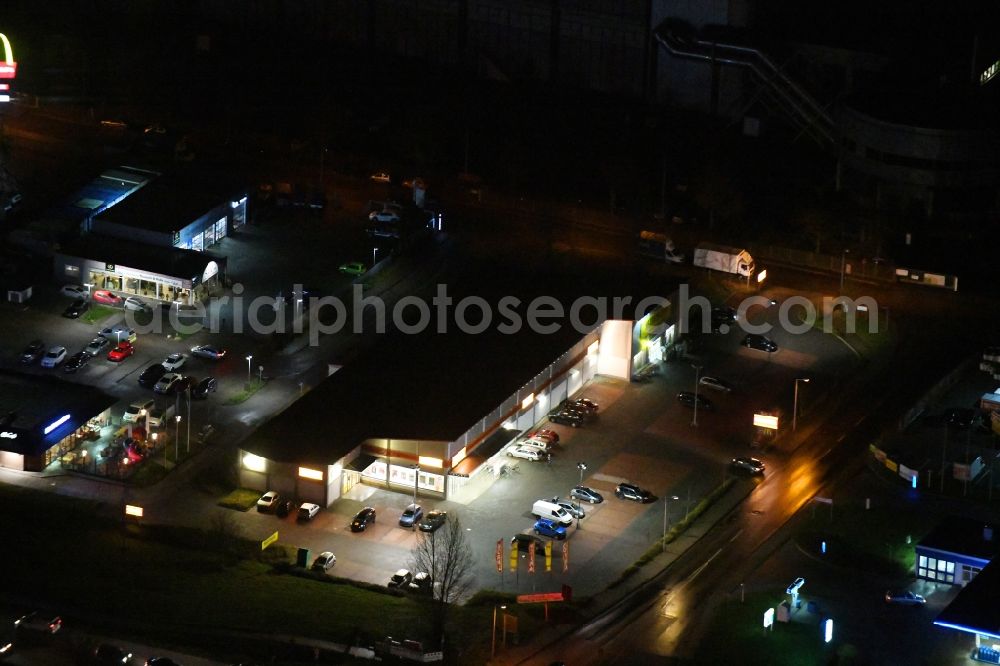 Ahrensfelde at night from above - Night lighting building of the shopping center NORMA on McDonald's-Strasse in the district Blumberg in Ahrensfelde in the state Brandenburg, Germany
