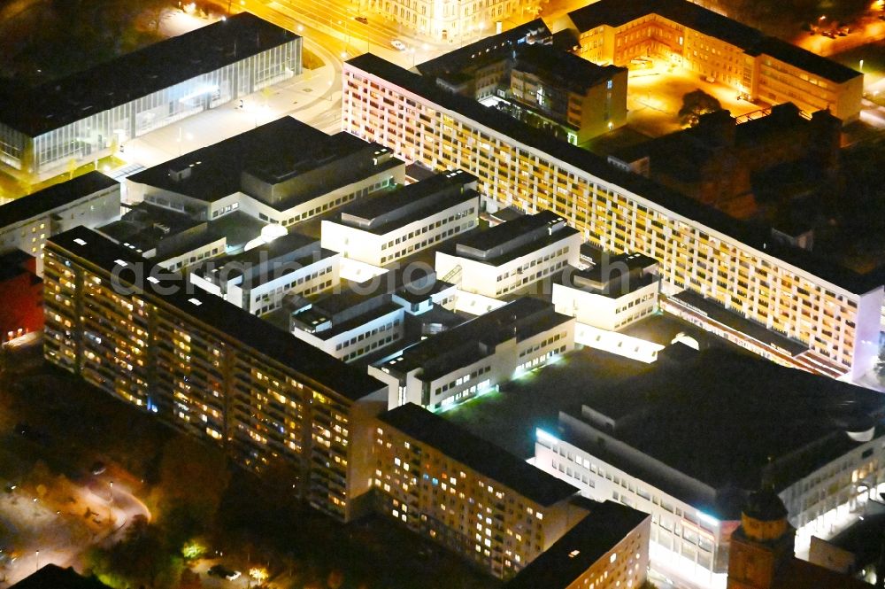 Aerial image at night Dessau - Night lighting building of the shopping center Rathaus-Center Dessau on Kavalierstrasse in Dessau-Rosslau in the state Saxony-Anhalt, Germany