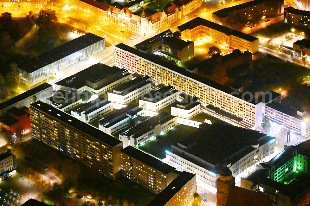 Dessau at night from above - Night lighting building of the shopping center Rathaus-Center Dessau on Kavalierstrasse in Dessau-Rosslau in the state Saxony-Anhalt, Germany