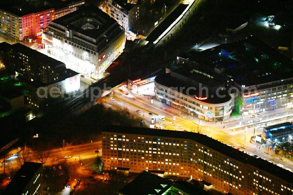 Berlin at night from the bird perspective: Night lighting building of the shopping center Ring Center 2 Am Containerbahnhof in the district Lichtenberg in Berlin, Germany