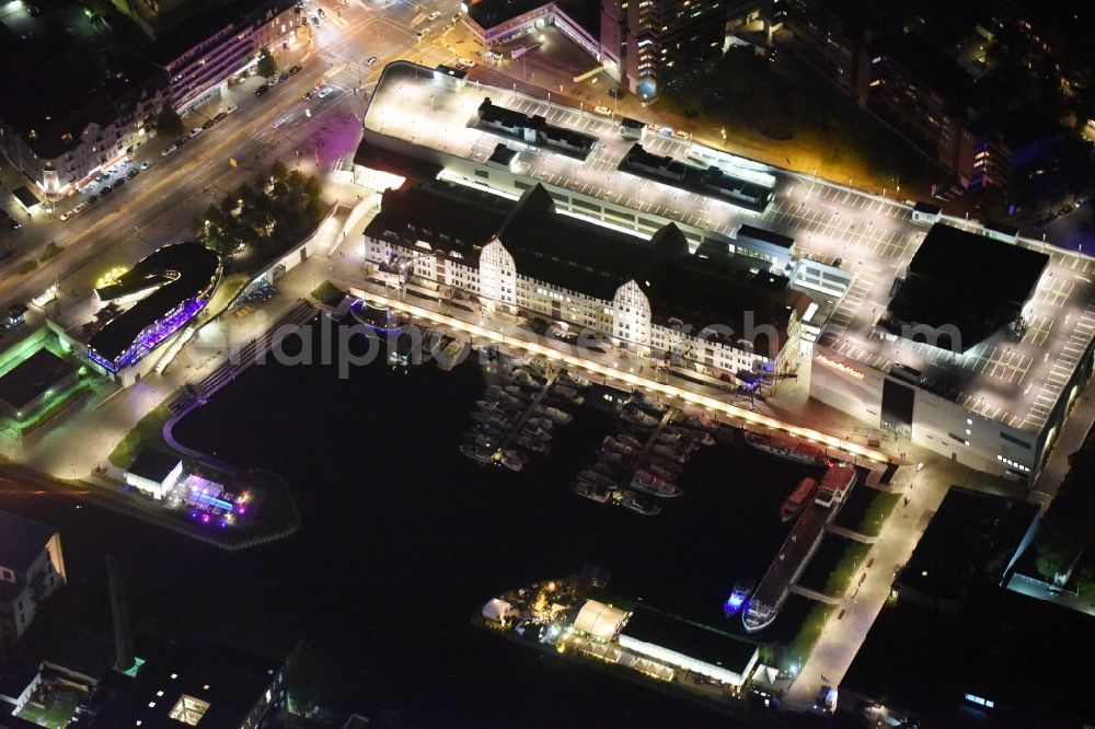 Aerial photograph at night Berlin - Night image with a view of the shopping mall Tempelhofer Hafen and Ullsteinhaus on Tempelhofer Damm in the district of Tempelhof in Berlin