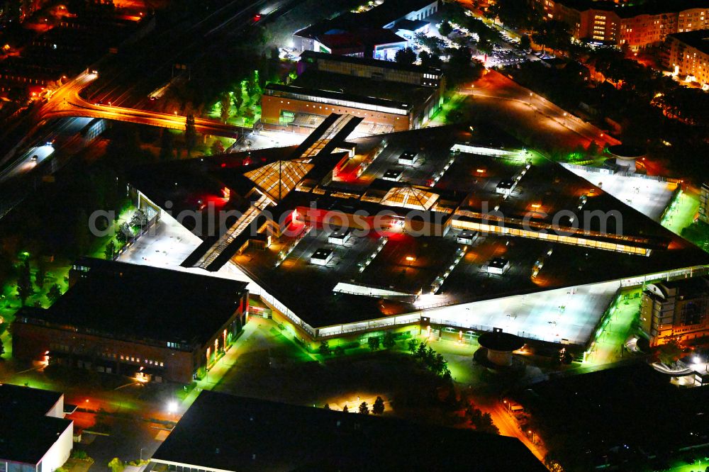 Aerial image at night Potsdam - Night lighting building of the shopping center Stern-Center in the district Drewitz in Potsdam in the state Brandenburg, Germany