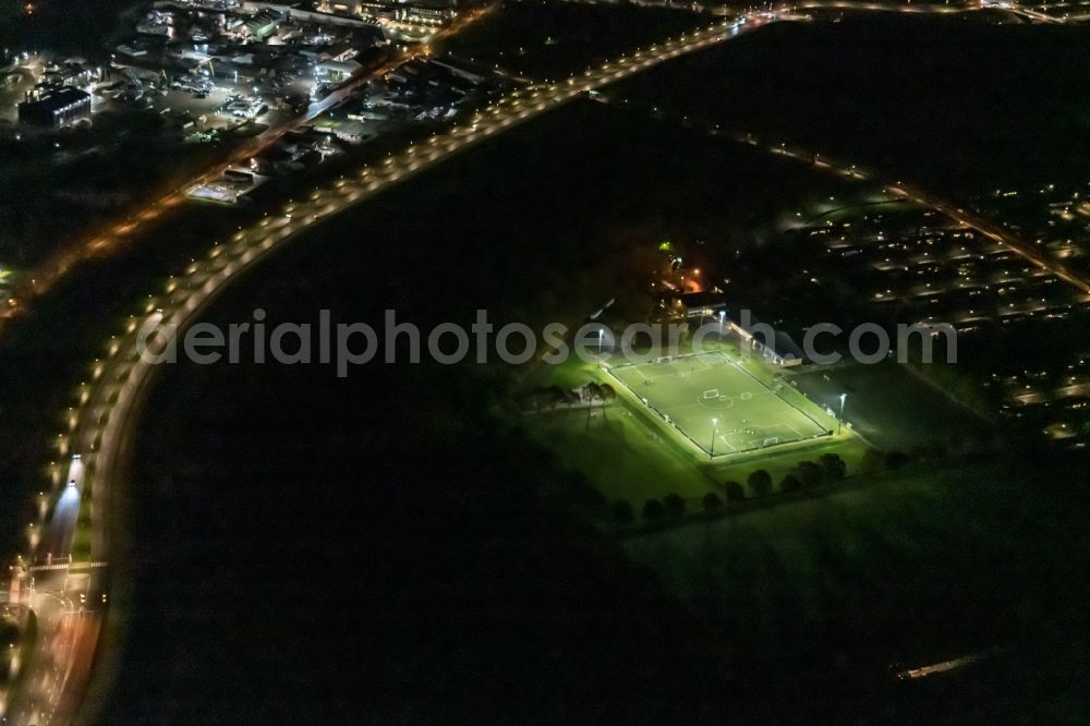 Aerial image at night Odense - Night lighting ensemble of sports grounds in the district Odense NOe in Odense in Syddanmark, Denmark