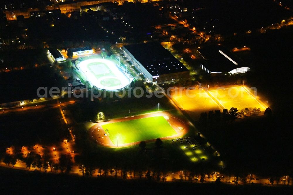 Aerial image at night Dresden - Night lighting ensemble of sports grounds Sportpark Ostra in the district Friedrichstadt in Dresden in the state Saxony, Germany