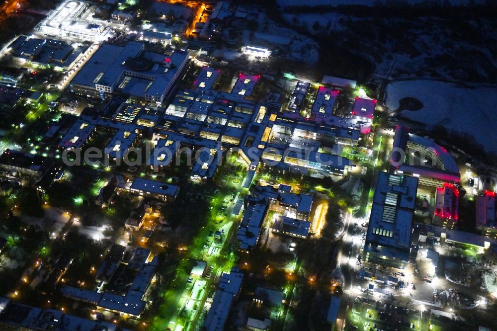 Lübeck at night from above - Night lighting construction site for a new extension to the hospital grounds UKSH Universitaetsklinikum Schleswig-Holstein in the district St. Juergen in Luebeck in the state Schleswig-Holstein, Germany