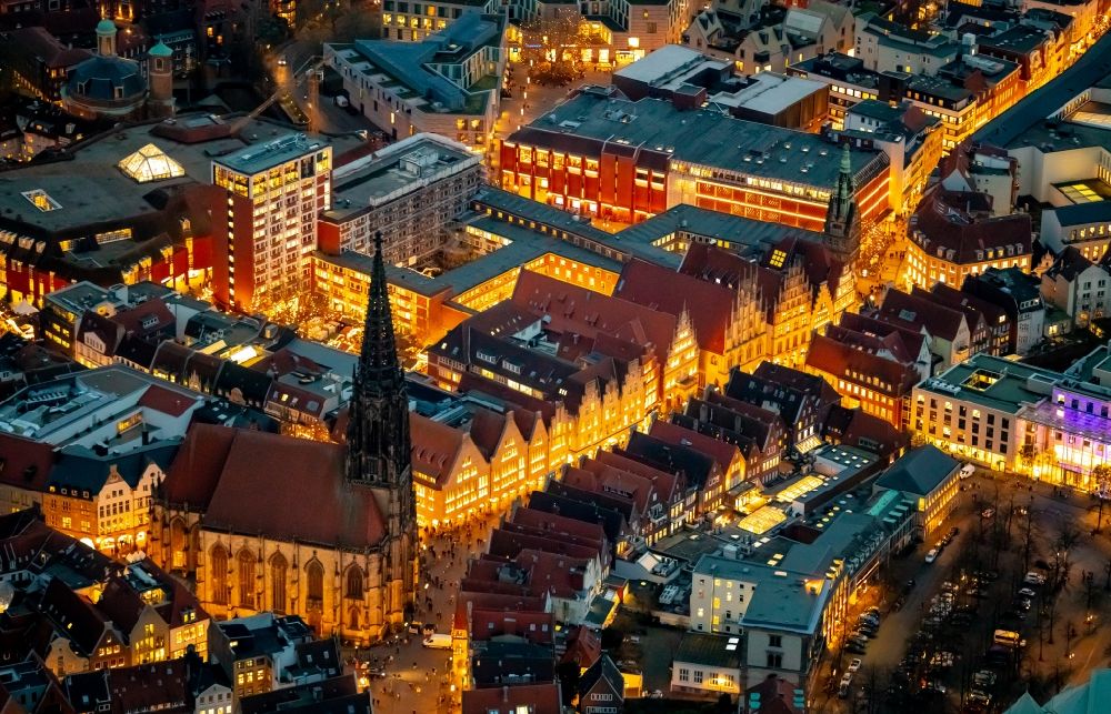 Münster at night from the bird perspective: Night lighting half-timbered house and multi-family house- residential area in the old town area and inner city center in Muenster in the state North Rhine-Westphalia, Germany