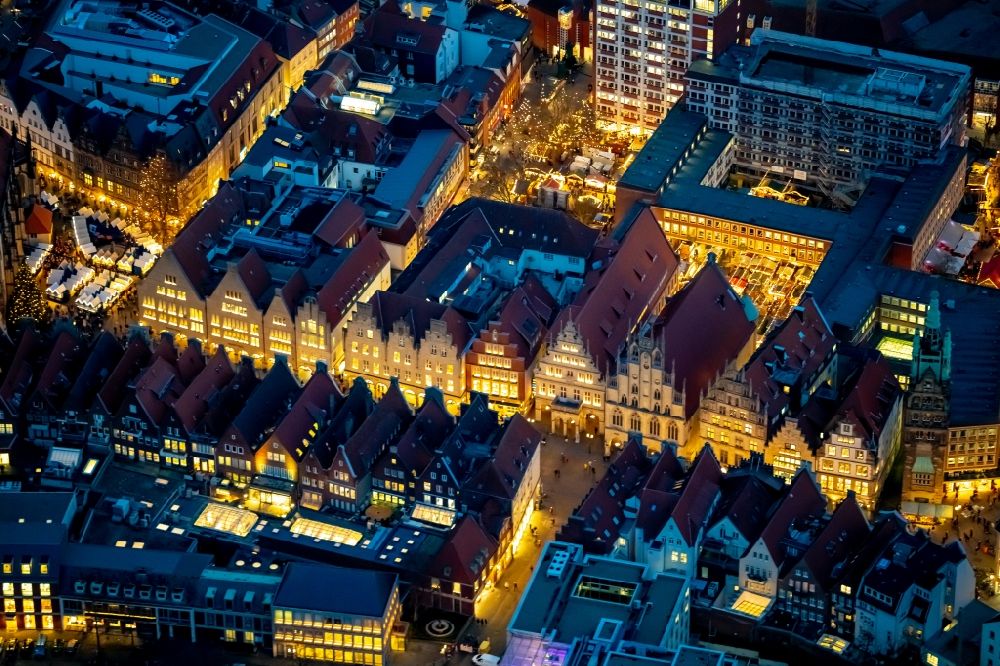 Aerial image at night Münster - Night lighting half-timbered house and multi-family house- residential area in the old town area and inner city center in Muenster in the state North Rhine-Westphalia, Germany