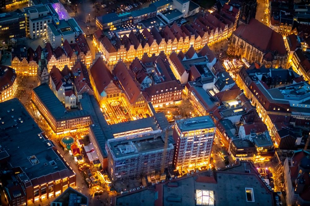 Münster at night from above - Night lighting half-timbered house and multi-family house- residential area in the old town area and inner city center in Muenster in the state North Rhine-Westphalia, Germany