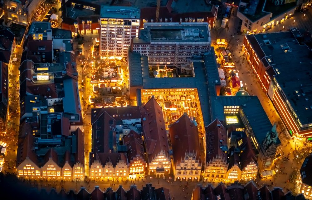 Aerial photograph at night Münster - Night lighting half-timbered house and multi-family house- residential area in the old town area and inner city center in Muenster in the state North Rhine-Westphalia, Germany