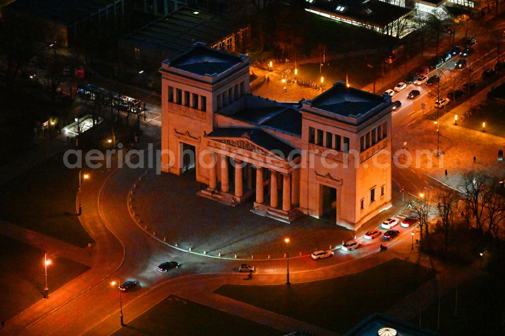 Aerial photograph at night München - Night lighting night view Facade of the monument Propylaeen on Koenigsplatz in Munich in the state Bavaria