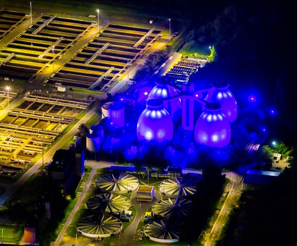 Aerial image at night Bottrop - Night lighting sewage works Basin and purification steps for waste water treatment in Bottrop at Ruhrgebiet in the state North Rhine-Westphalia, Germany