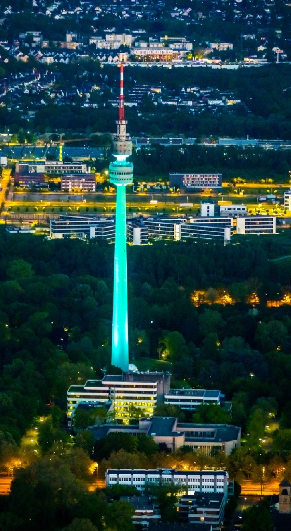 Dortmund at night from the bird perspective: Night lighting television Tower Florian-Turm in the district Ruhrallee Ost on park Westfalenpark in Dortmund at Ruhrgebiet in the state North Rhine-Westphalia, Germany
