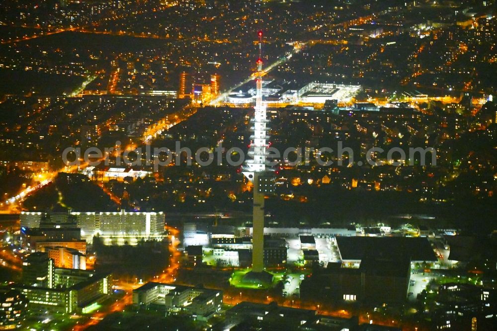 Aerial photograph at night Hannover - Night lighting Television Tower of DFMG Deutsche Funkturm GmbH on Neue-Land-Strasse in the district Buchholz-Kleefeld in Hannover in the state Lower Saxony, Germany