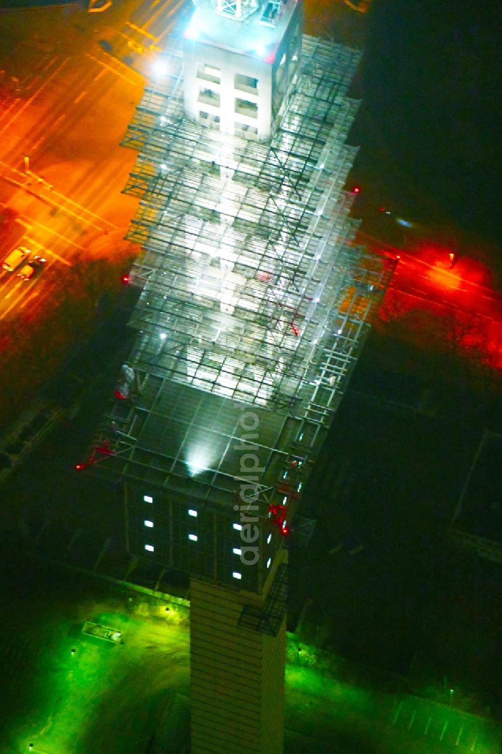 Hannover at night from above - Night lighting Television Tower of DFMG Deutsche Funkturm GmbH on Neue-Land-Strasse in the district Buchholz-Kleefeld in Hannover in the state Lower Saxony, Germany
