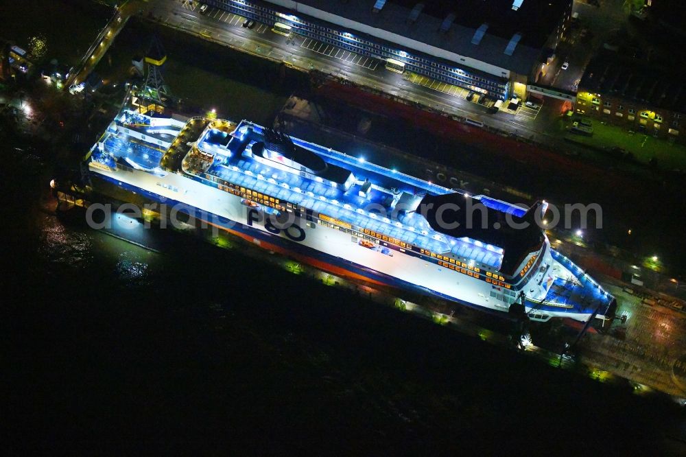 Aerial photograph at night Hamburg - Night lighting ferry ship SPIRIT OF FRANCE on Shipyard on the elbe banks in Hamburg, Germany