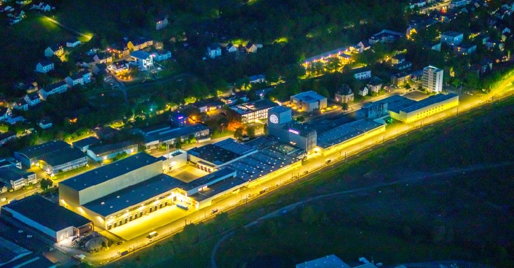 Aerial photograph at night Witten - Night lighting company grounds and facilities of ARDEX GmbH on Friedrich-Ebert-Strasse in the district Ruedinghausen in Witten at Ruhrgebiet in the state North Rhine-Westphalia, Germany