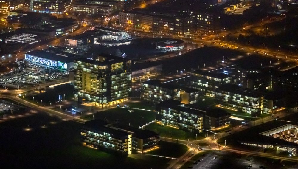 Essen at night from the bird perspective: Night lighting company premises of and headquarters of thyssenkrupp AG in the destrict Bochold in Essen in the federal state of North Rhine-Westphalia, Germany