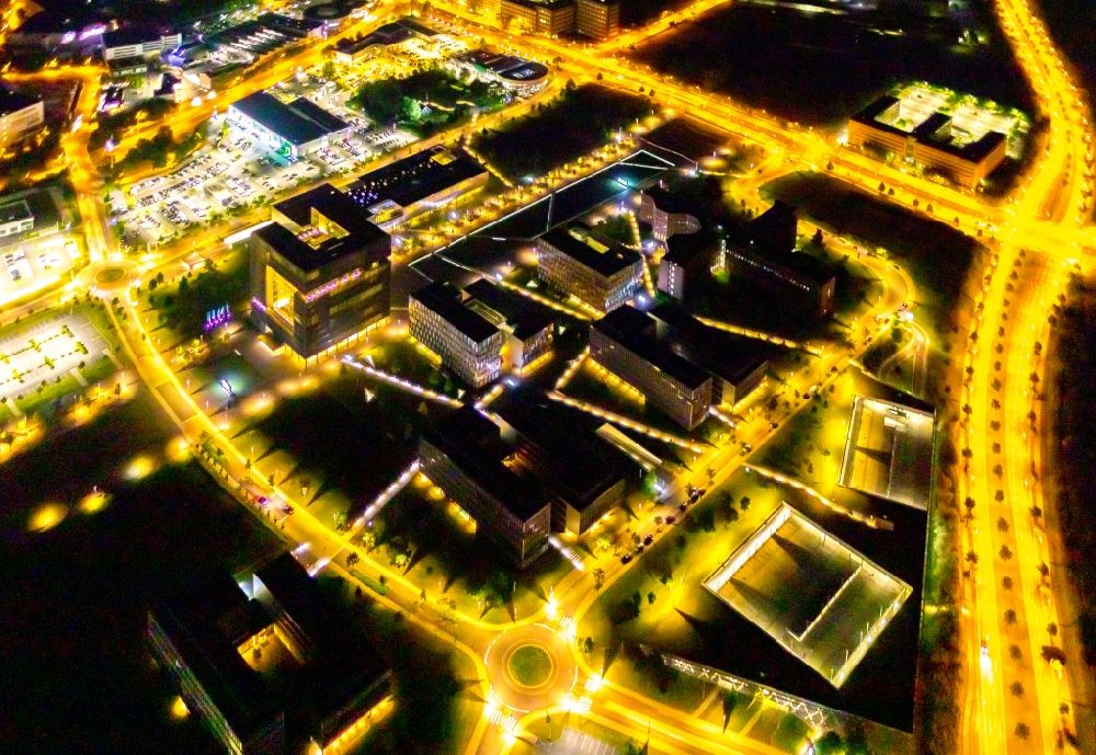 Aerial photograph at night Essen - Night lighting company premises of and headquarters of thyssenkrupp AG in Essen in the federal state of North Rhine-Westphalia, Germany