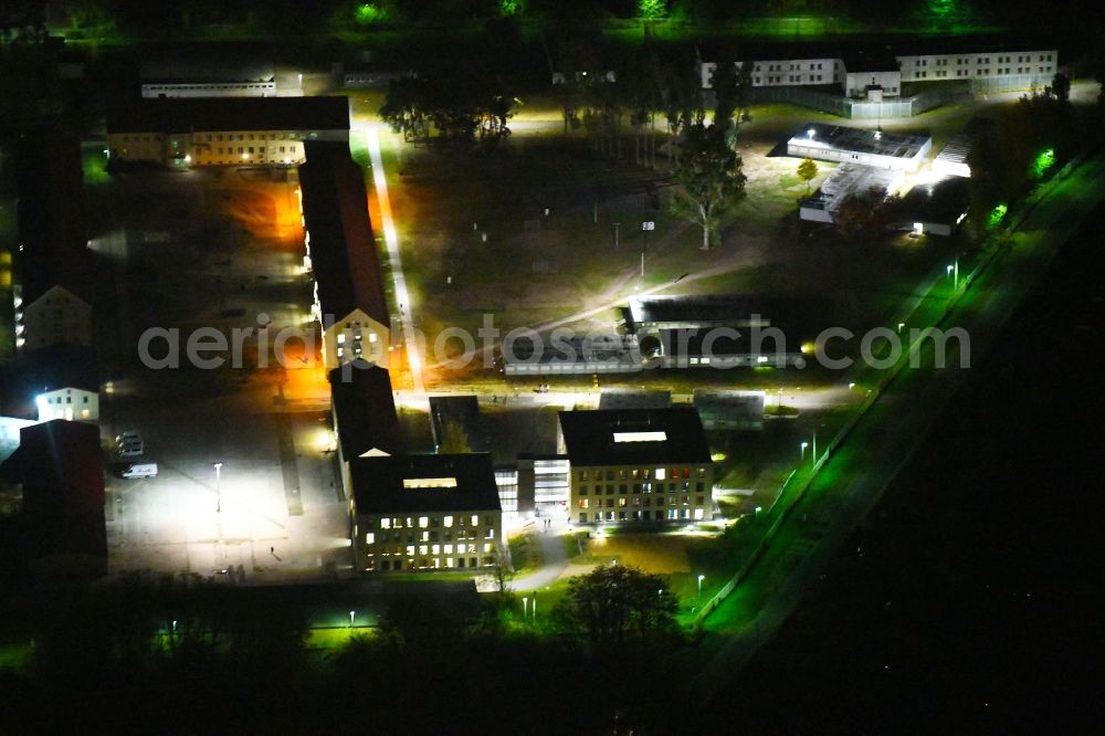 Eisenhüttenstadt at night from the bird perspective: Night lighting Refugee - buildings of ZABH Central Immigration Office in Eisenhuettenstadt in the state Brandenburg