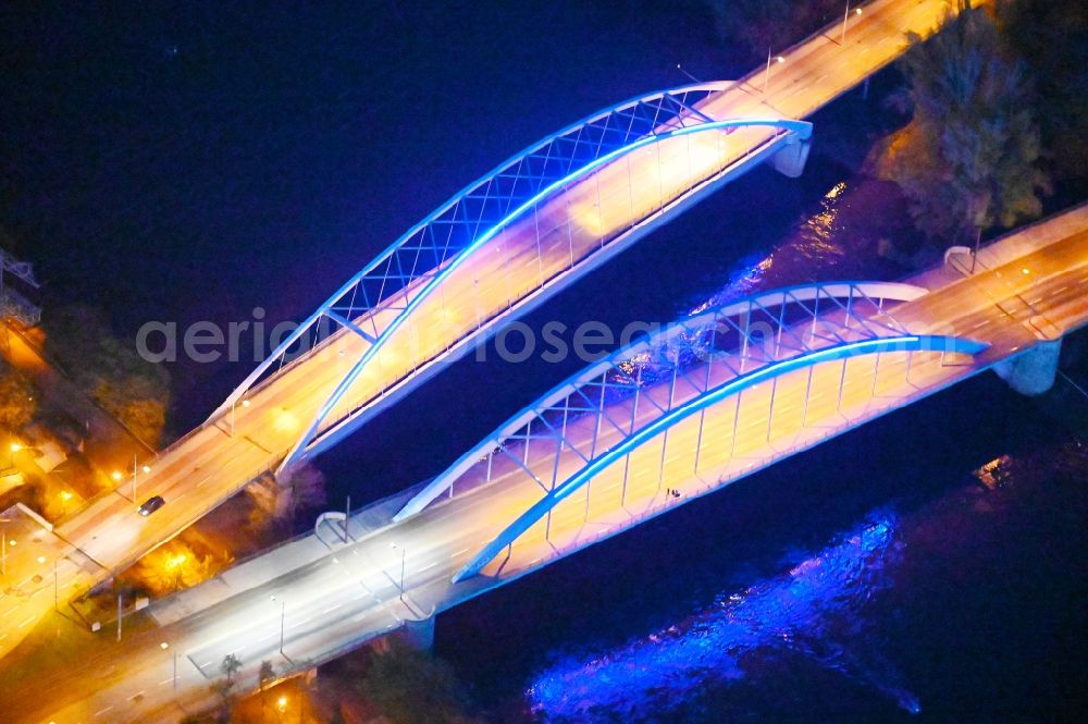 Aerial photograph at night Magdeburg - Night lighting River - bridge construction about the Elbe in Magdeburg in the state Saxony-Anhalt, Germany