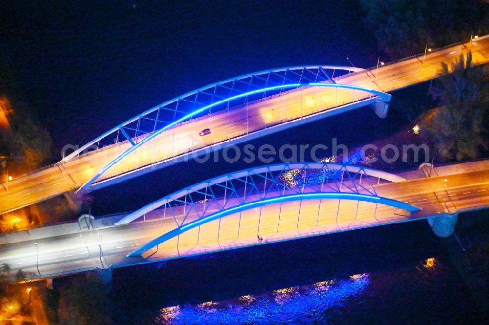 Aerial image at night Magdeburg - Night lighting River - bridge construction about the Elbe in Magdeburg in the state Saxony-Anhalt, Germany