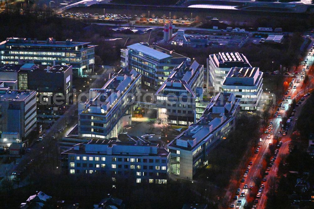 Aerial photograph at night München - Night lighting research building and office complex Institut fuer Chemische Epigenetik (ICEM) and BioSysM on street Wuermtalstrasse in Munich in the state Bavaria, Germany