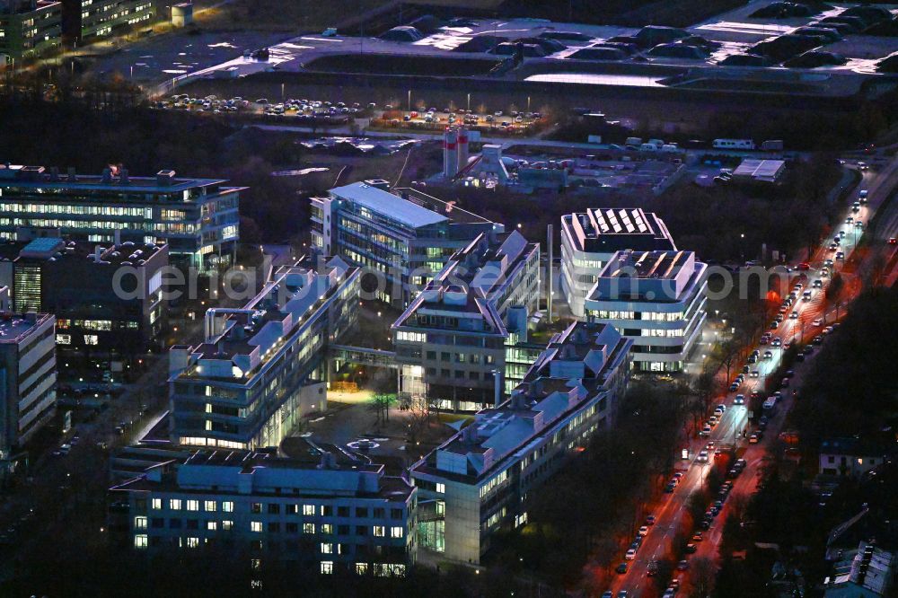 Aerial image at night München - Night lighting research building and office complex Institut fuer Chemische Epigenetik (ICEM) and BioSysM on street Wuermtalstrasse in Munich in the state Bavaria, Germany
