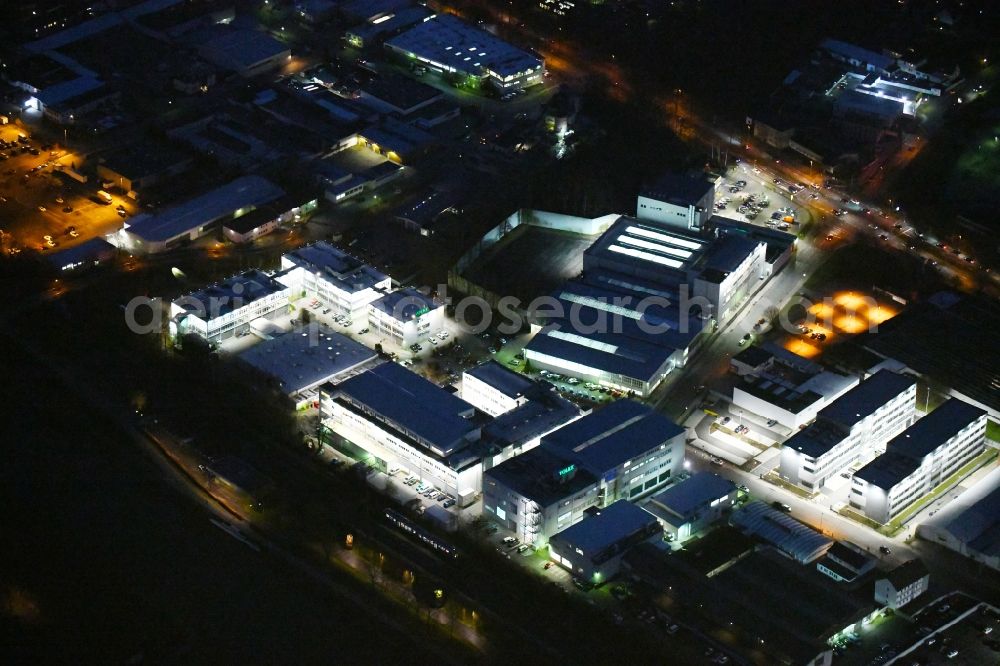 Aerial image at night Wolfsburg - Night lighting Research building and office complex VOLKE Entwicklungsring SE on Daimlerstrasse in the district Hesslingen in Wolfsburg in the state Lower Saxony, Germany