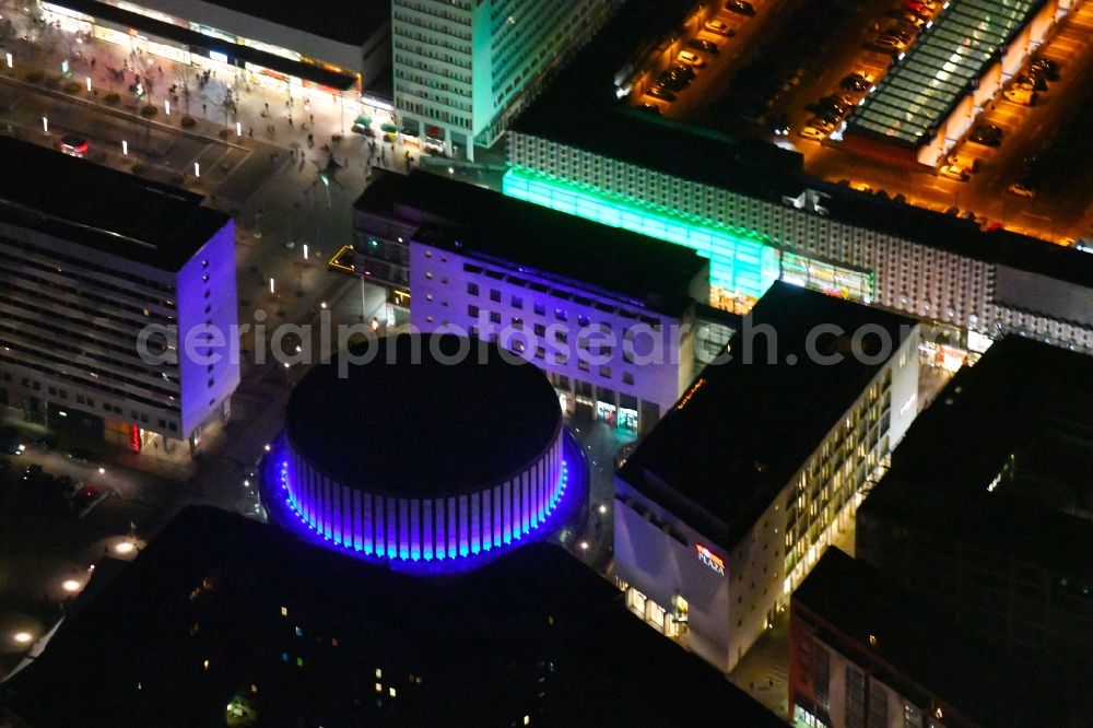 Aerial image at night Dresden - Night lights and lighting Building of the round cinema - Rundkino Dresden. The rotunda is located on the Prager Strasse in the district Altstadt in Dresden in the federal state of Saxony, Germany