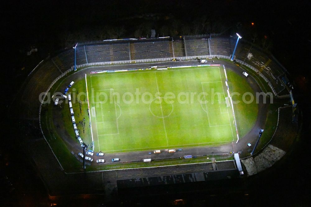 Aerial photograph at night Leipzig - Night lighting Football stadium Bruno-Plache-Stadion on Connewitzer Strasse in the district Suedost in Leipzig in the state Saxony, Germany