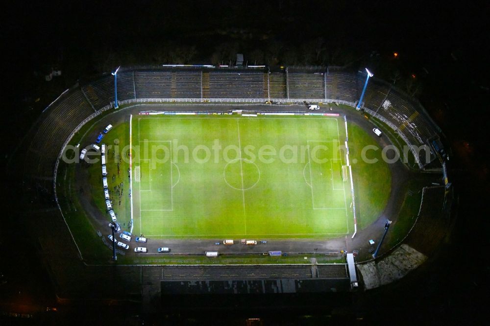 Aerial image at night Leipzig - Night lighting Football stadium Bruno-Plache-Stadion on Connewitzer Strasse in the district Suedost in Leipzig in the state Saxony, Germany