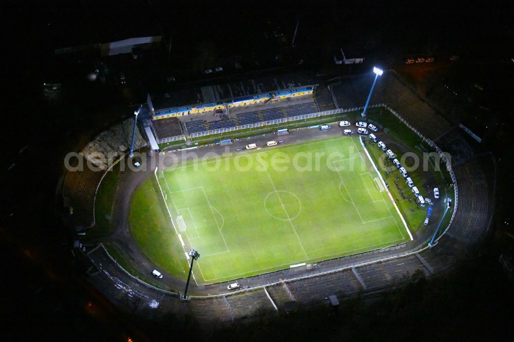 Aerial photograph at night Leipzig - Night lighting Football stadium Bruno-Plache-Stadion on Connewitzer Strasse in the district Suedost in Leipzig in the state Saxony, Germany