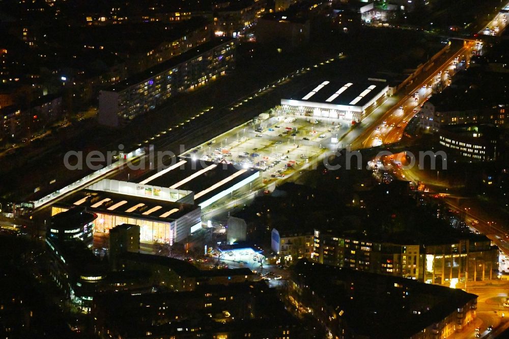 Berlin at night from above - Night lighting Building of the construction market BAUHAUS Berlin-Kurfuerstendamm in the district Halensee in Berlin, Germany