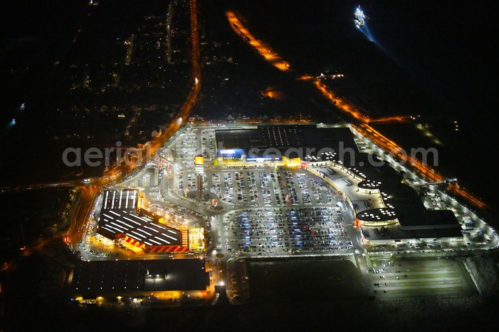 Lübeck at night from above - Night lighting building of the construction market HORNBACH in the district Daenischburg - Siems - Rangenberg - Wallberg in Luebeck in the state Schleswig-Holstein, Germany