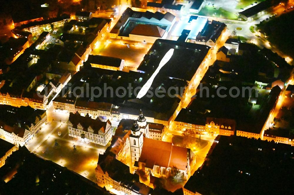 Lutherstadt Wittenberg at night from above - Night lighting Building of the shopping center ARSENAL in Lutherstadt Wittenberg in the state Saxony-Anhalt