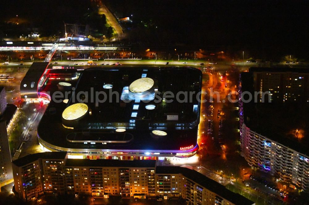 Aerial photograph at night Berlin - Night lighting building of the shopping center Eastgate Berlin on Marzahner Promenade in the district Marzahn in Berlin, Germany